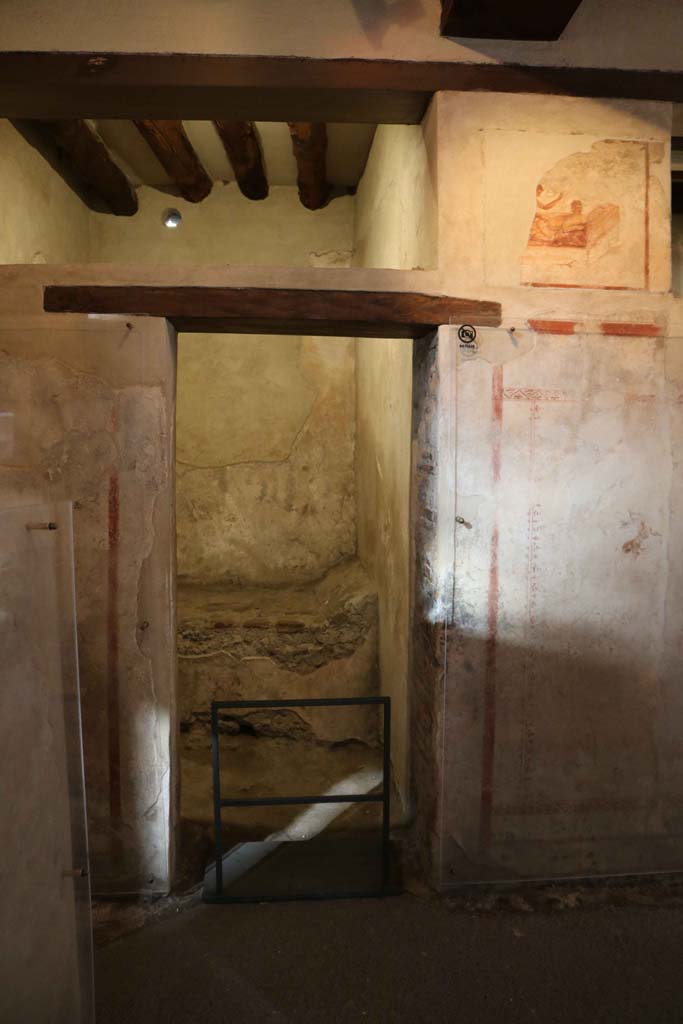 VII.12.18, Pompeii. December 2018. 
Looking towards doorway on north side. Photo courtesy of Aude Durand.
