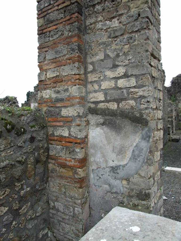 VII.14.5 Pompeii.  March 2009. Room 21.  Pillar with plaster.