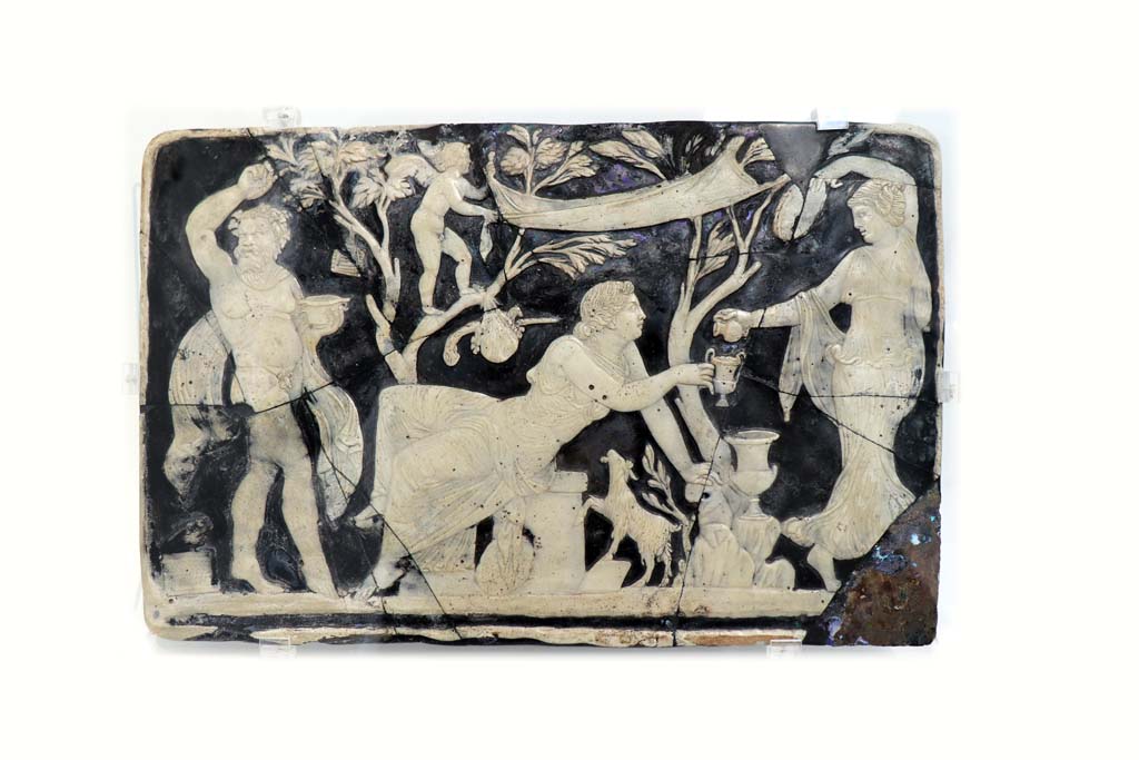 VIII.1.4 Pompeii. February 2021. 
Glass cameo panel decorating furniture and depicting Bacchus and Ariadne, found in the House of Fabius Rufus, VII.16.17-22, room 62.
Photo courtesy of Fabien Bièvre-Perrin (CC BY-NC-SA).