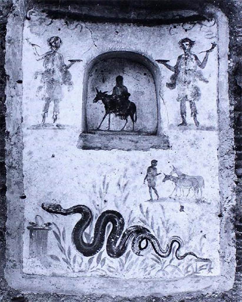IX.2.24 Pompeii. Old photo of lararium and niche on west wall of stable.
According to Frhlich, on the lower left was a painted altar with a snake approaching, through plants, from the right.  
Above right was a man leading two donkeys.  
In the niche was a female figure on a donkey, perhaps Vesta, Epona or Isis-Epona. 
Two Lares were at the top, one on either side of the niche.  
See Frhlich, T., 1991, Lararien und Fassadenbilder in den Vesuvstdten.  Mainz: von Zabern.  (L99: p.293, T. 42,3).
