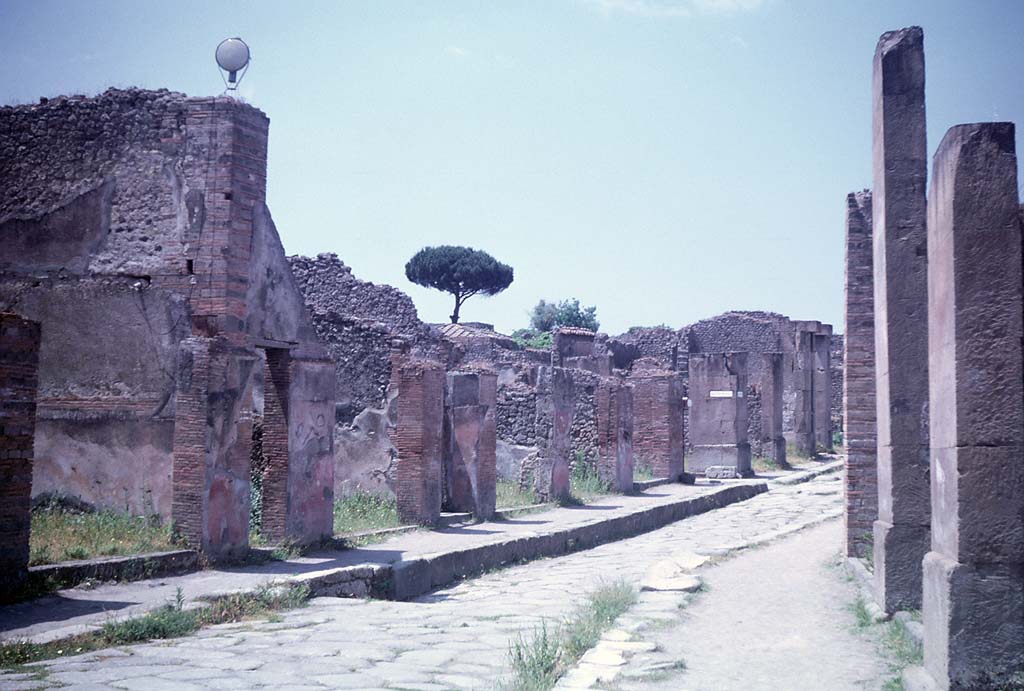 Via dell’Abbondanza, south side, Pompeii. June 1962. 
Looking west along VIII.4. and towards VIII.5, from near VII.1.7. Photo courtesy of Rick Bauer.
