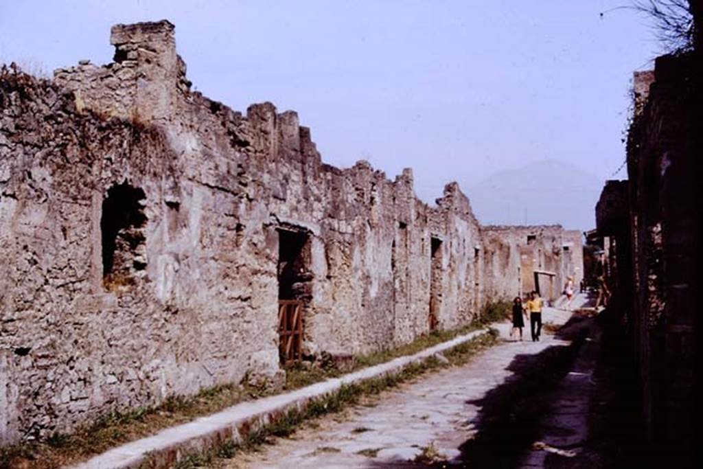 Via di Nocera, Pompeii. 1972. Looking north along I.14 from near I.14.2. Photo by Stanley A. Jashemski. 
Source: The Wilhelmina and Stanley A. Jashemski archive in the University of Maryland Library, Special Collections (See collection page) and made available under the Creative Commons Attribution-Non Commercial License v.4. See Licence and use details. J72f0392
