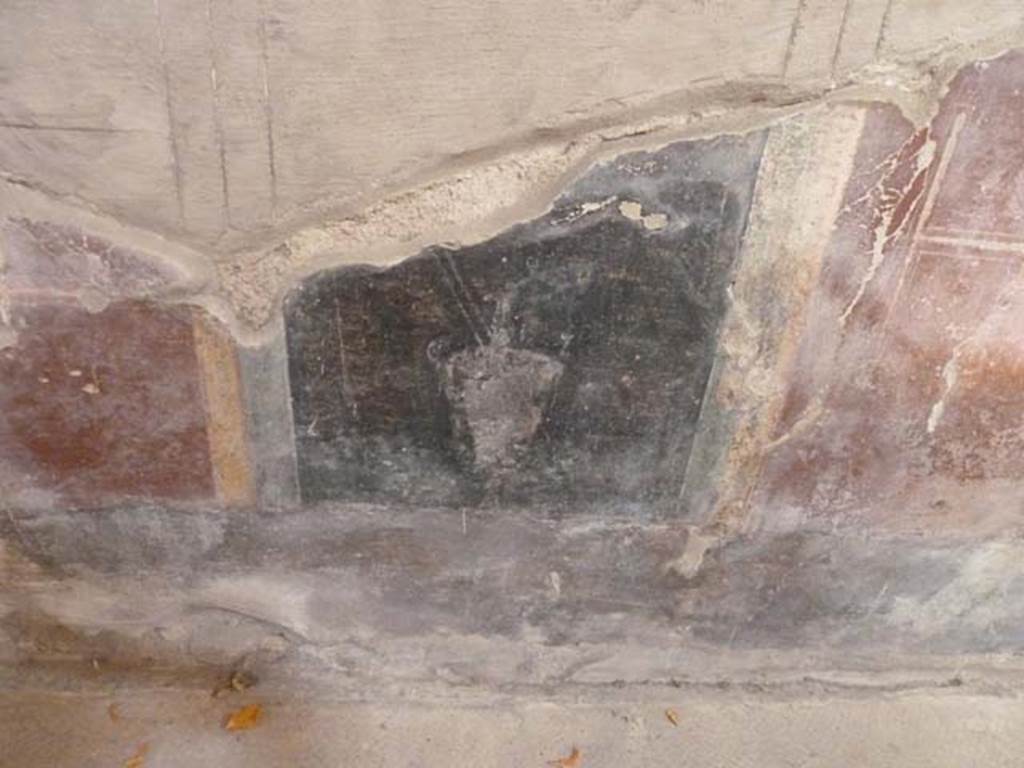 Oplontis, September 2015. Room 8, zoccolo on west end of north wall below central painting.