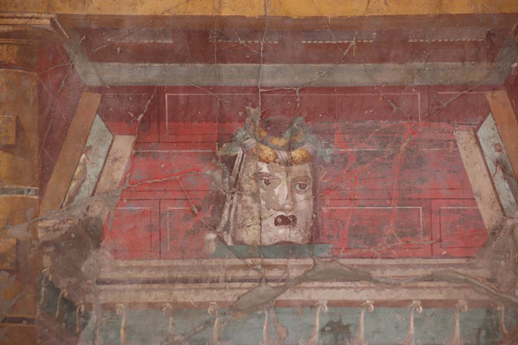 Oplontis Villa of Poppea, September 2021. Room 23, mask in centre of west wall. Photo courtesy of Klaus Heese.