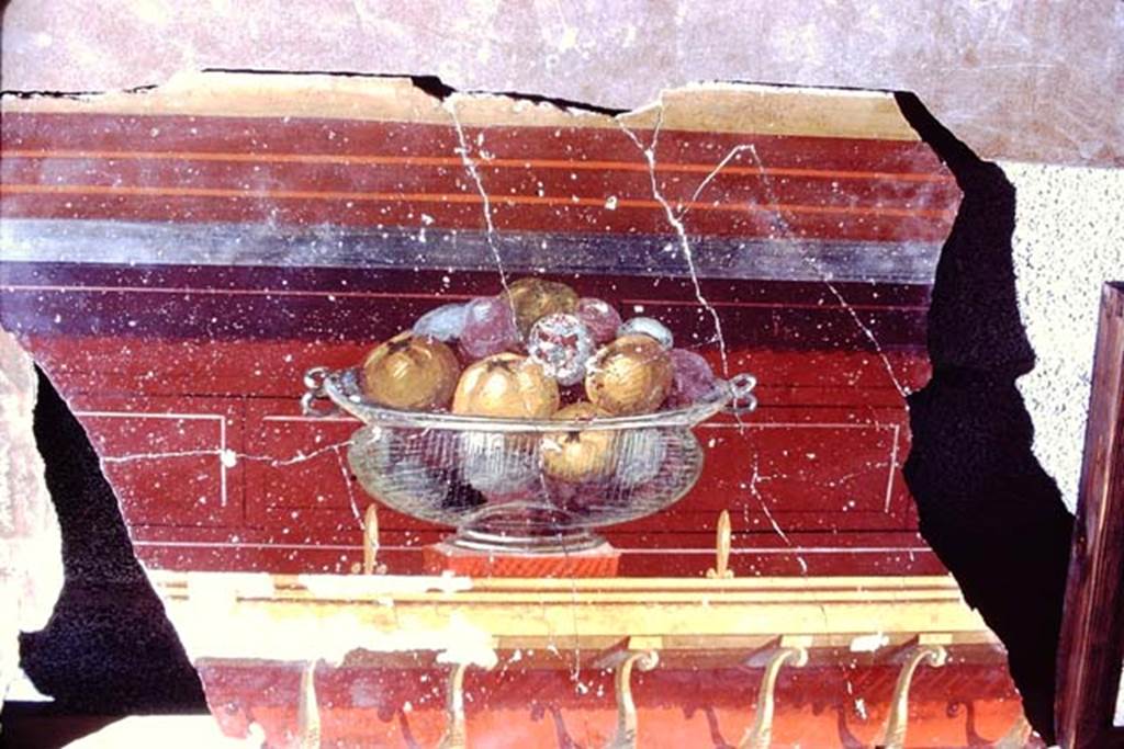 Oplontis, 1968.  Room 23, painted wall with still-life of glass bowl with pomegranates. Photo by Stanley A. Jashemski. 
Source: The Wilhelmina and Stanley A. Jashemski archive in the University of Maryland Library, Special Collections (See collection page) and made available under the Creative Commons Attribution-Non Commercial License v.4. See Licence and use details. J68f1468
