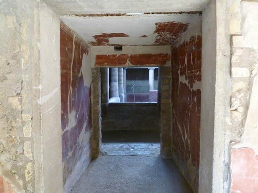 Oplontis, May 2011. Room 24, corridor 37 on north side of portico, leading through to Room 32, the rustic peristyle.  Photo courtesy of Michael Binns.
