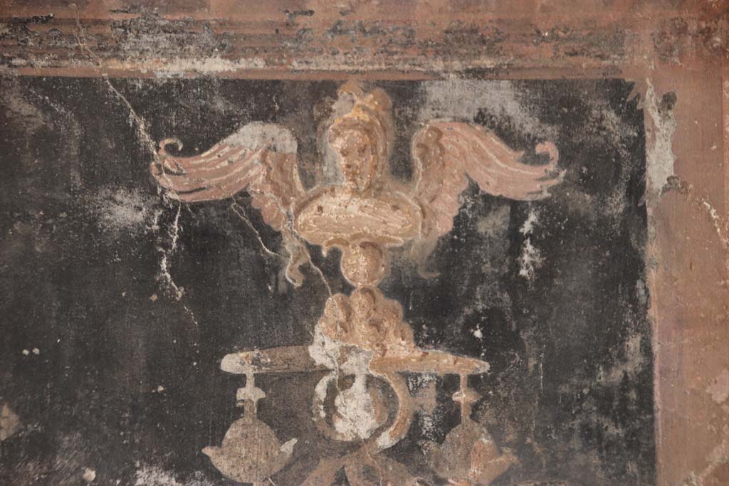 Oplontis Villa of Poppea, September 2021.  
Area 40, detail of top of painted golden twisted candelabra from north wall in north-east corner. Photo courtesy of Klaus Heese.
