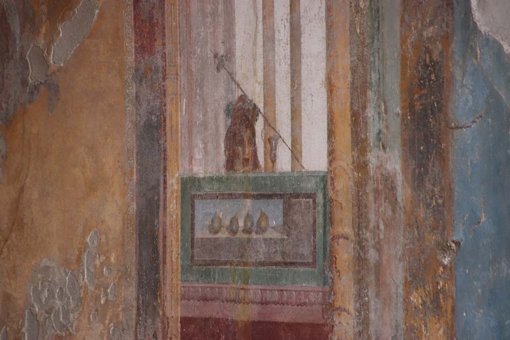 Stabiae, Villa Arianna, September 2021. Room 3, painted panel with mask from west wall. Photo courtesy of Klaus Heese.