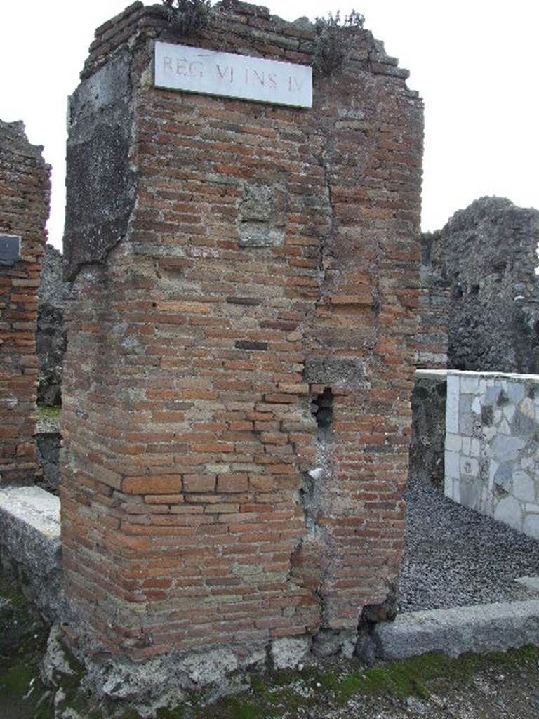 Left hand wall of VI.4.1, site of street shrine with serpent painting. December 2006. The painting of the serpent is no longer visible.   
