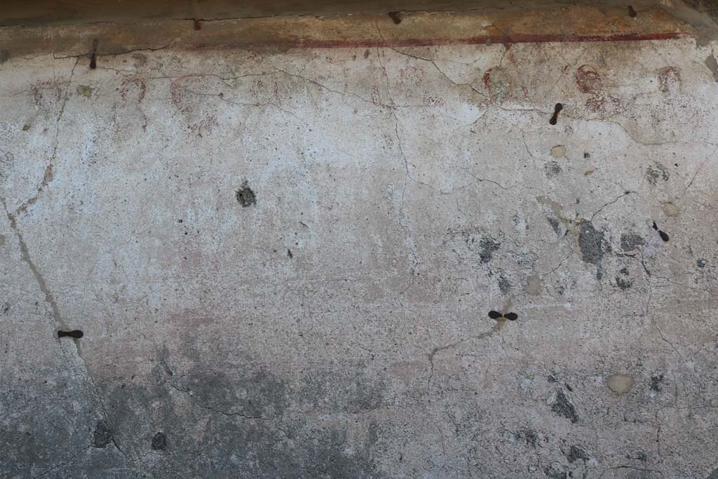 Painted street shrine to twelve gods on corner of insula at VIII.3.11 in December 2018.  Photo courtesy of Aude Durand.