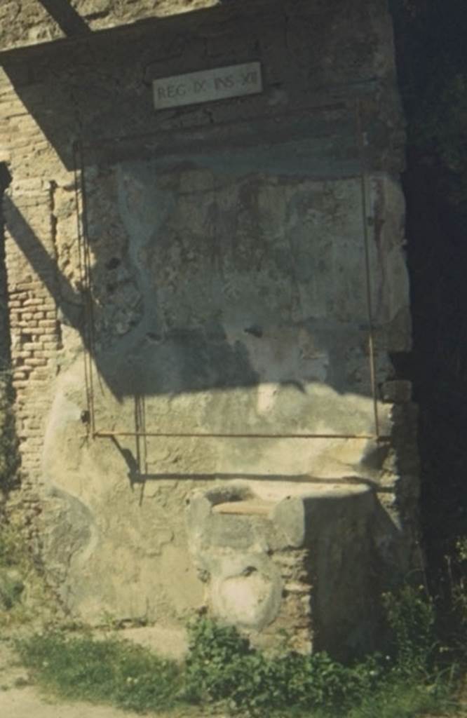 Street Altar outside IX.12.7. Painting above altar. Photographed 1970-79 by G�nther Einhorn, picture courtesy of his son Ralf Einhorn.