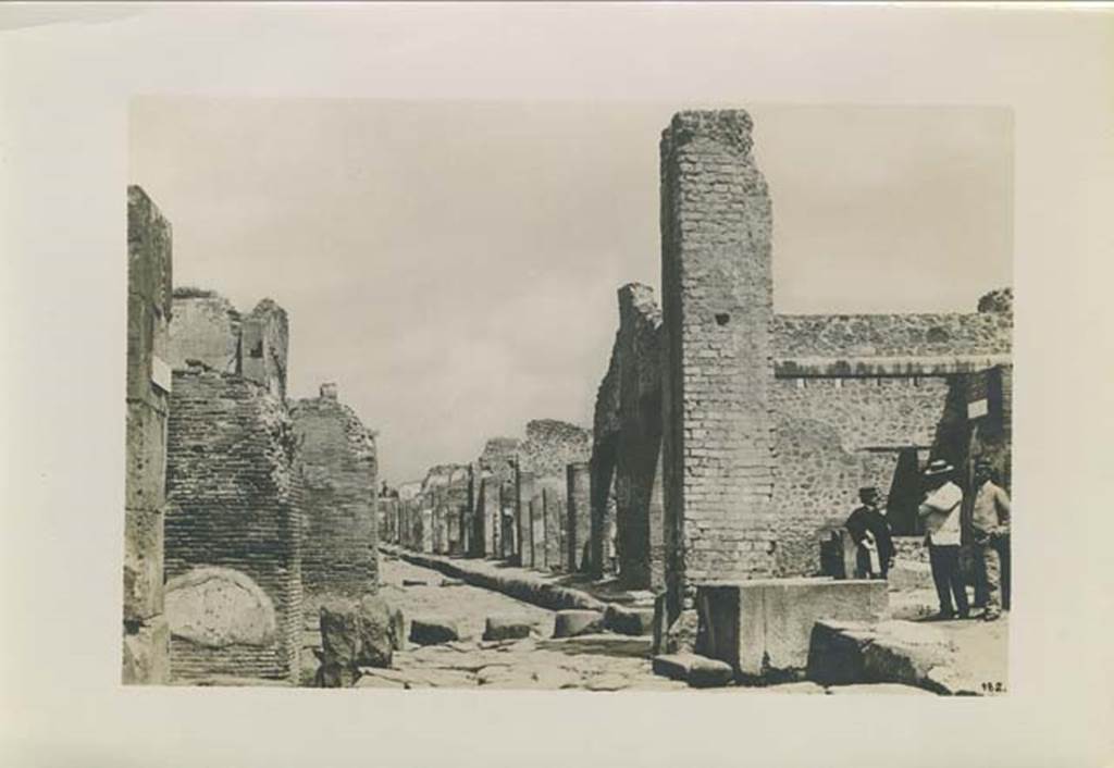 Fountain outside I.4.15 on Via Stabiana. Photograph by Sommer, numbered 182, c.1879. Looking north at Holconius� crossroads, from between VIII.4 and I.4. Photo courtesy of Rick Bauer.
