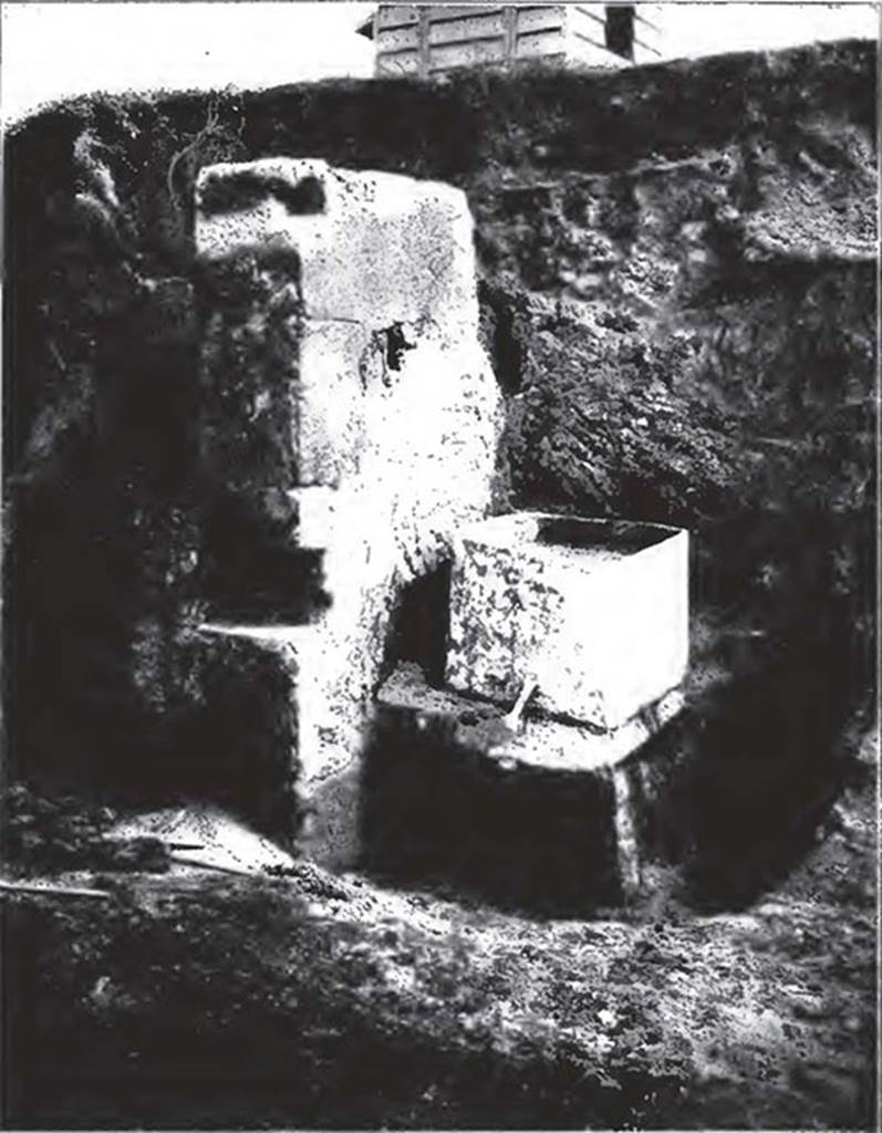 Water column on north-west corner of II.2 on Vicolo di Octavius Quarto. 1916-17.
The top of the water column is shown during excavation. 
On it was found a lead tank which had two pipes, one presumably bringing water in and one to take it out. 
See Notizie degli scavi di antichit�: Vol 14, 1917. Roma: Real Accademia dei Lincei. (p. 255).

