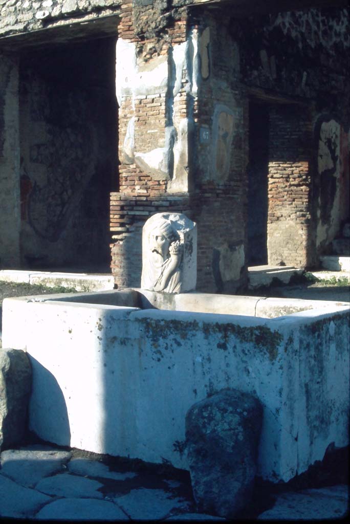 Fountain outside VII.9.67 and 68, Pompeii. 4th December 1971.
Photo courtesy of Rick Bauer, from Dr.George Fay�s slides collection.
