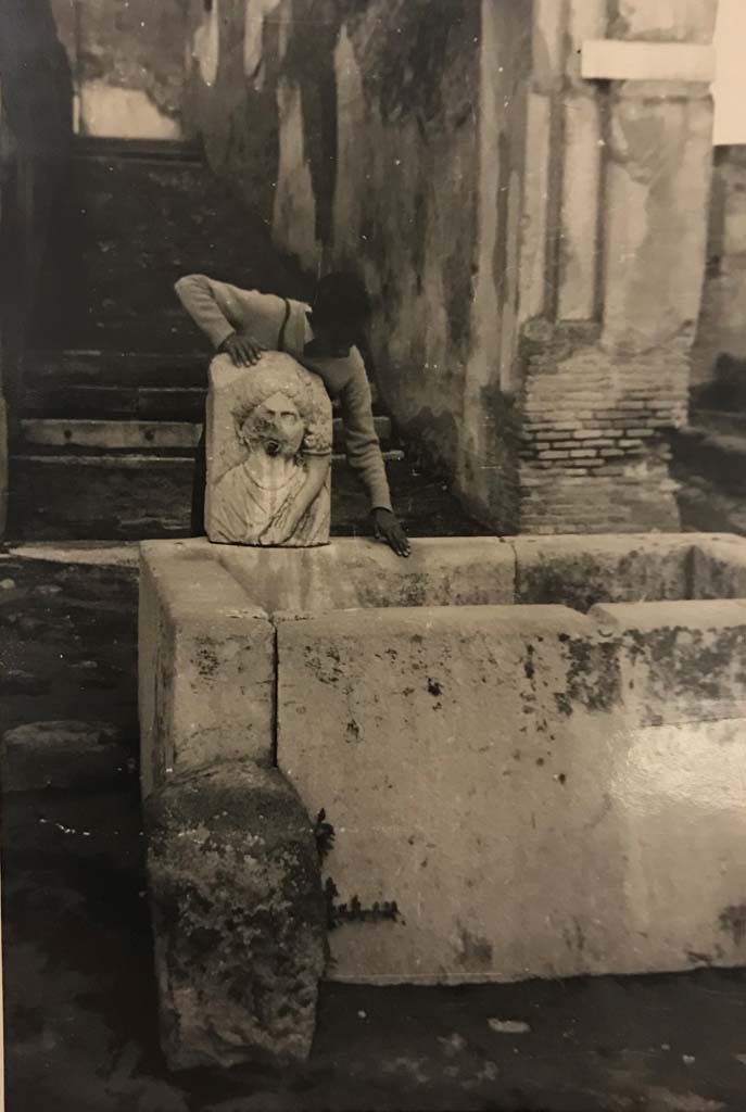 VII.9.67 Pompeii, 1944. Fountain and rear steps leading up to Eumachia�s building. 
Photo courtesy of Rick Bauer.
(This photo was in an album belonging to a sailor assigned to Patrol Squadron 63 (VP-63).) 
