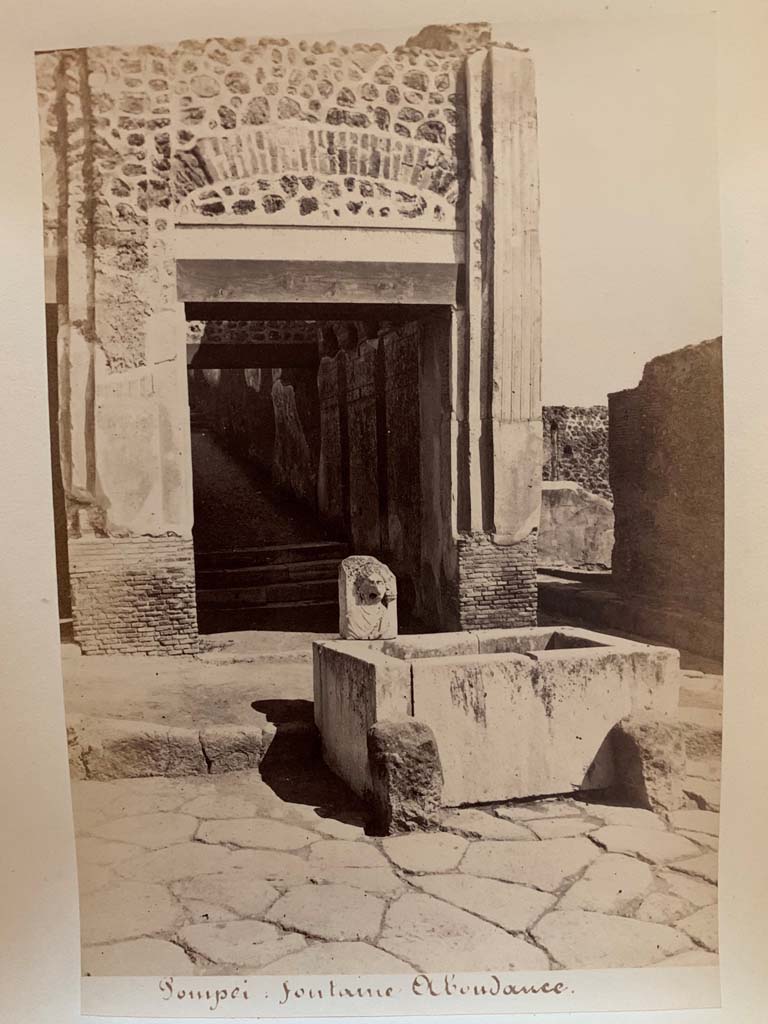 VII.9.67 Pompeii. Photograph by M. Amodio, from an album dated April 1878.
Looking north on Via dell�Abbondanza towards fountain. Photo courtesy of Rick Bauer.
