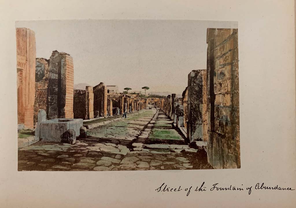 Fountain outside VII.9.67. Via dell� Abbondanza, Pompeii. From a coloured album by M. Amodio, dated c.1880. Looking east. Photo courtesy of Rick Bauer.