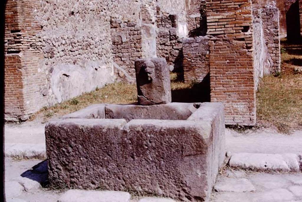 Fountain outside VII.14.13 and VII.14.14 on Via dell�Abbondanza, Pompeii. 1975. Photo by Stanley A. Jashemski.   
Source: The Wilhelmina and Stanley A. Jashemski archive in the University of Maryland Library, Special Collections (See collection page) and made available under the Creative Commons Attribution-Non Commercial License v.4. See Licence and use details. J75f0373
