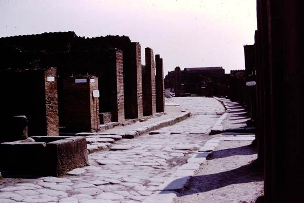 Fountain outside VII.14.13 and VII.14.14 on Via dell�Abbondanza, Pompeii. 1975. Looking east. Photo by Stanley A. Jashemski.   
Source: The Wilhelmina and Stanley A. Jashemski archive in the University of Maryland Library, Special Collections (See collection page) and made available under the Creative Commons Attribution-Non Commercial License v.4. See Licence and use details.
J75f0372

