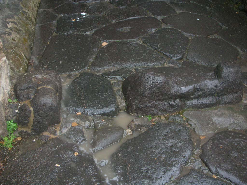 Porta Marina, Pompeii. May 2011.
Looking towards lava blocks on north side of wider tunnel of gate. Photo courtesy of Ivo van der Graaff.