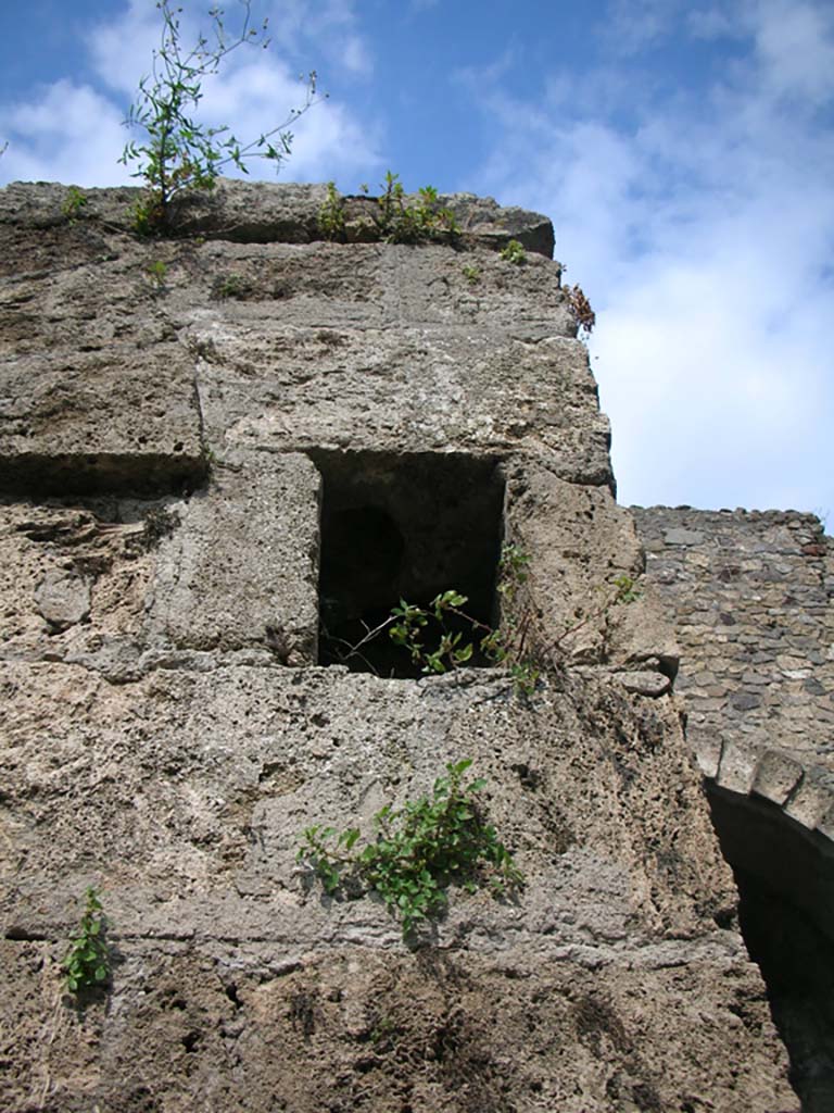 Porta Marina, Pompeii. May 2011. 
Niche/recess on upper pilaster on south side of pedestrian tunnel, on left. Photo courtesy of Ivo van der Graaff.
