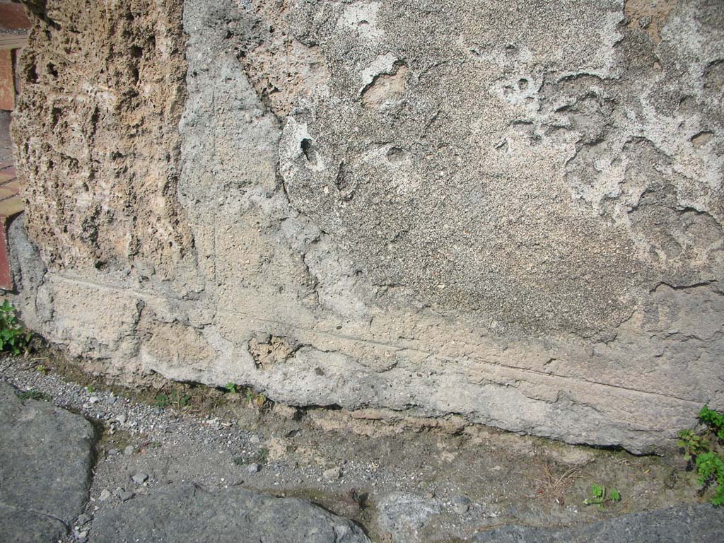 Porta Marina, Pompeii. May 2011. 
Lower pilaster on south side of pedestrian tunnel with remaining plaster. Photo courtesy of Ivo van der Graaff.
