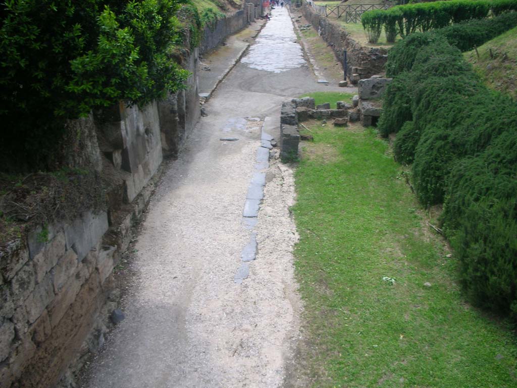 Porta di Sarno or Sarnus Gate. May 2010. 
Looking west through site of gate towards Via dell’Abbondanza. Photo courtesy of Ivo van der Graaff.
