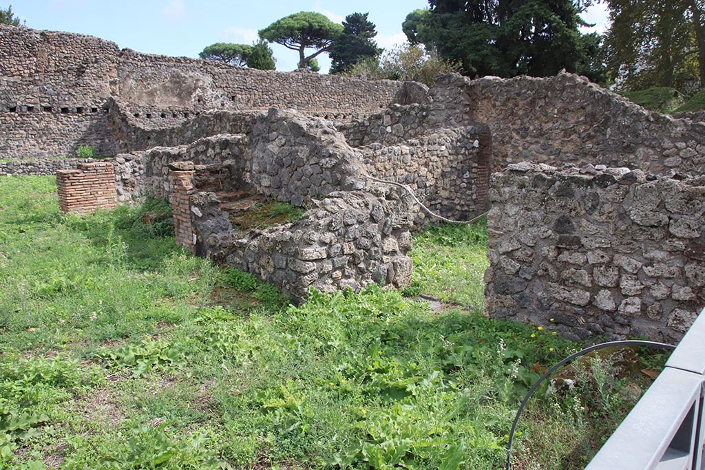 I.1.8 Pompeii. October 2024. Looking towards south wall of entrance room, with doorway leading to I.1.6. Photo courtesy of Klaus Heese.