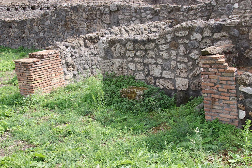 I.1.8 Pompeii. October 2024. Looking south-east towards doorway leading to small room behind I.1.6. Photo courtesy of Klaus Heese.