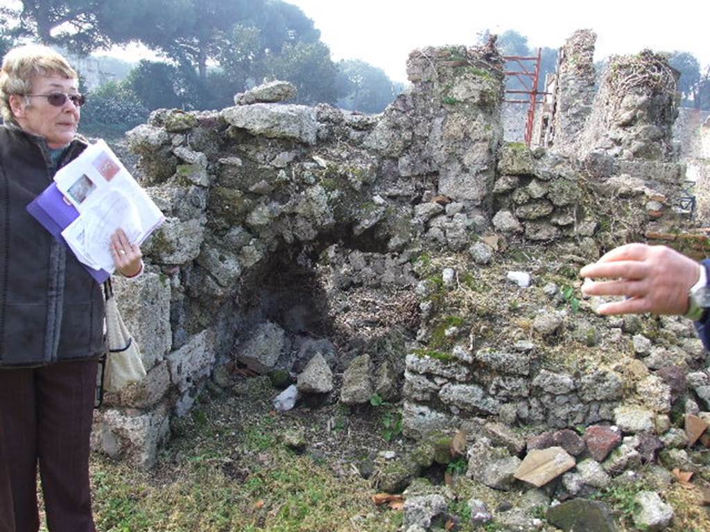 I.2.3 Pompeii. December 2006. South side of garden area. Looking west at remains of stairs with cupboard underneath.

