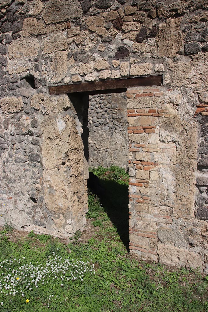 1.2.6 Pompeii. October 2024. 
Doorway in east wall of atrium onto north portico. Photo courtesy of Klaus Heese.
