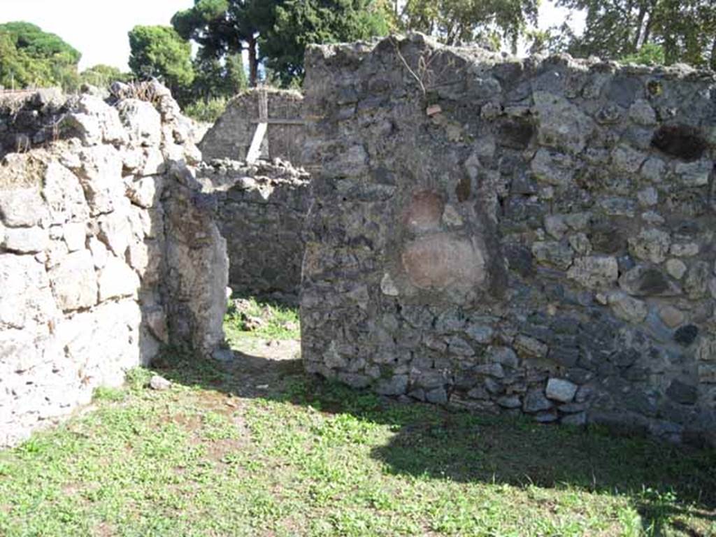 I.2.7 Pompeii. September 2010. Looking towards south-east corner of shop, with doorway.Photo courtesy of Drew Baker.
