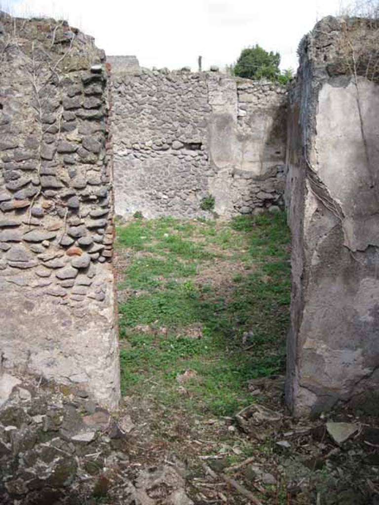 I.2.15 Pompeii. September 2010. East wall with doorway to south-west corner of atrium. Photo courtesy of Drew Baker.