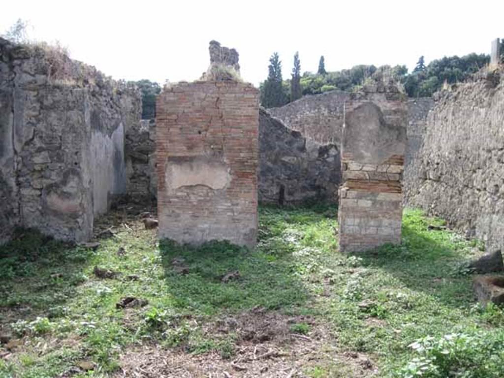 I.2.15 Pompeii. September 2010. West wall of the atrium. Photo courtesy of Drew Baker.
