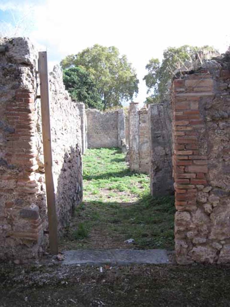 1.2.16 Pompeii. September 2010. Entrance doorway, looking south from across unnamed vicolo. Photo courtesy of Drew Baker.
According to Warscher, �I.2.16 � la casa � stata rifatta sugli avanzi di altra pi� antica, caduta forse per il terremoto�.
See Warscher T., 1935. Codex Topographicus Pompeianus: Regio I.2. Rome: DAIR.
(translation: I.2.16 � "the house had been repaired from the remains of another more ancient one, fallen perhaps by the earthquake�.)