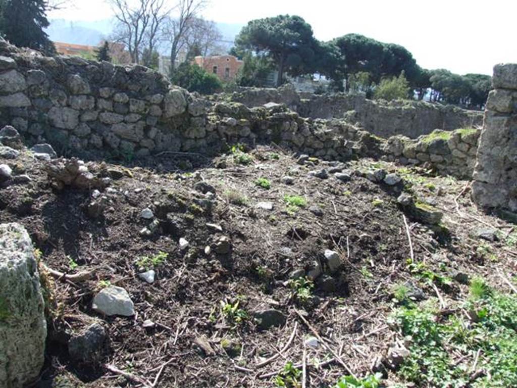 I.2.20 Pompeii.  March 2009. Site of staircase to upper floor, and two small rear rooms in south west corner of garden area.