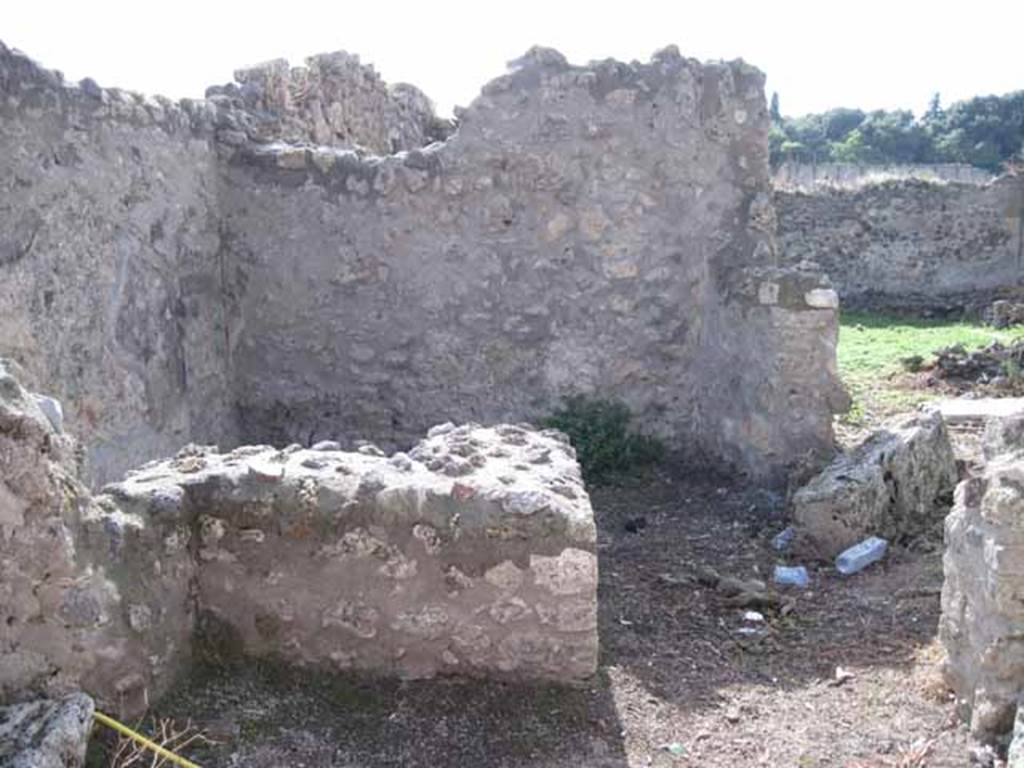 I.2.21 Pompeii. September 2010. Looking west towards entrance doorway across vicolo.
Photo courtesy of Drew Baker. According to Warscher, quoting Fiorelli, she described �
�Il thermopolium no.21 aveva una sola taberna, col banco rivestito di marmi, ed un separato focolare, a destra della porta�.  (translation: �The thermopolium no.21, had only one room, with bench faced with marble, and a separate hearth, to the right of the door�.)
See Fiorelli, Descrizione, p.45/46.
See Pappalardo, U., 2001. La Descrizione di Pompei per Giuseppe Fiorelli (1875). Napoli: Massa Editore, (p.36).
See Warscher T., 1935. Codex Topographicus Pompeianus: Regio I.2. Rome: DAIR, whose copyright it remains.

