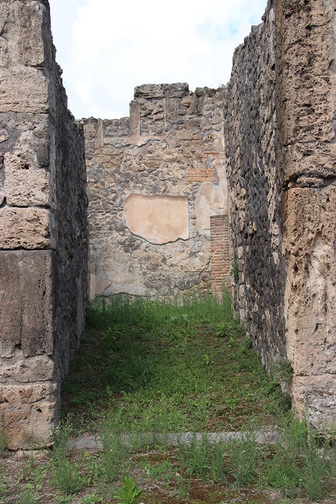 I.2.24 Pompeii. October 2024. 
Looking north along entrance corridor/fauces. Photo courtesy of Klaus Heese.
