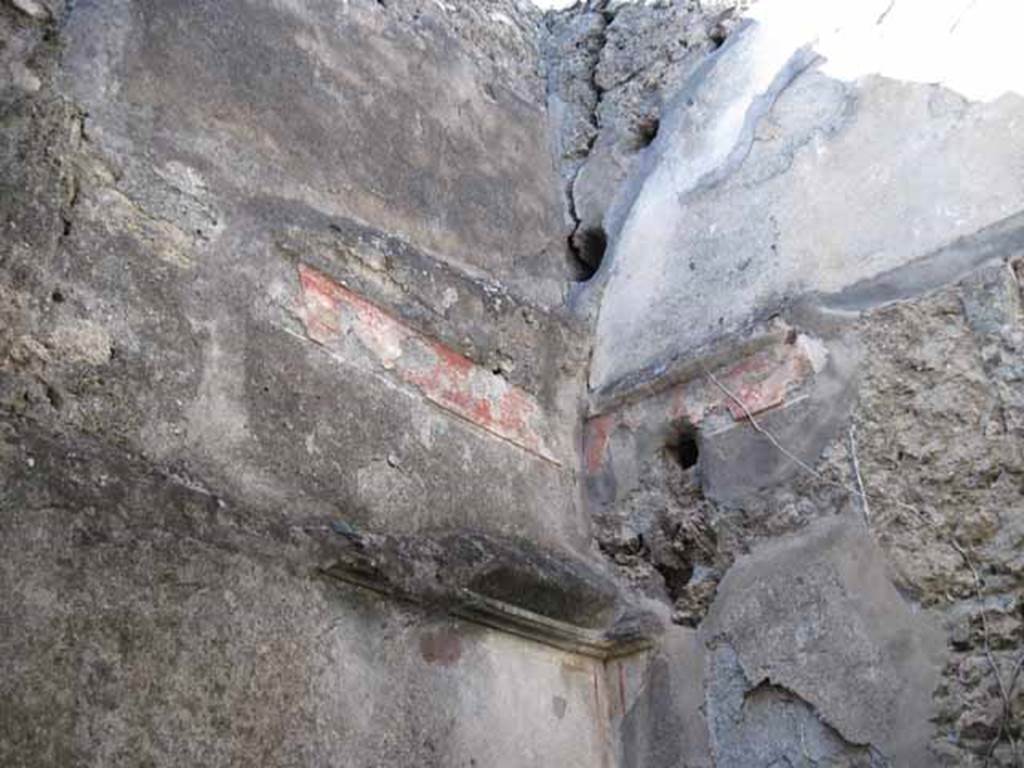 I.2.28 Pompeii. September 2010. North-west corner of cubiculum with remaining plasterwork, fresco and curved roof. Photo courtesy of Drew Baker.
