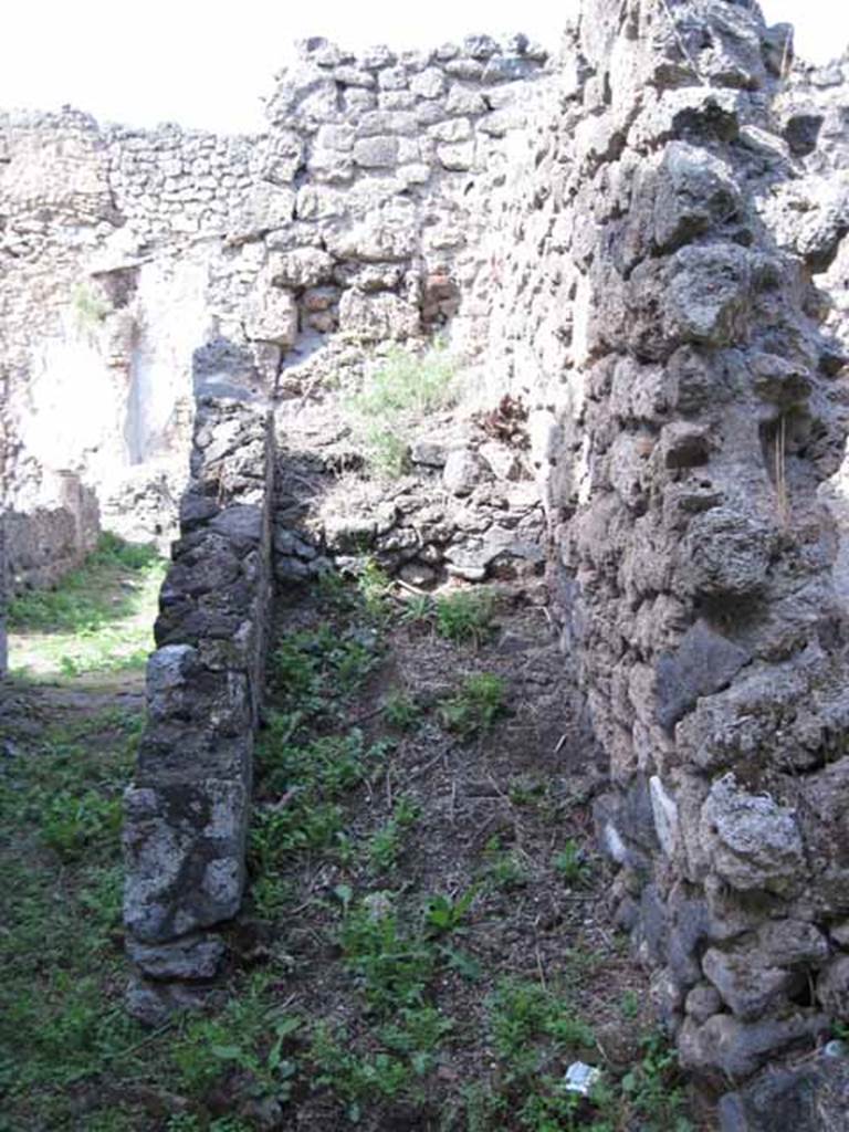 I.2.28 Pompeii. September 2010. Steps to upper floor on east side of corridor, with a doorway on the right of the photo. Photo courtesy of Drew Baker.
