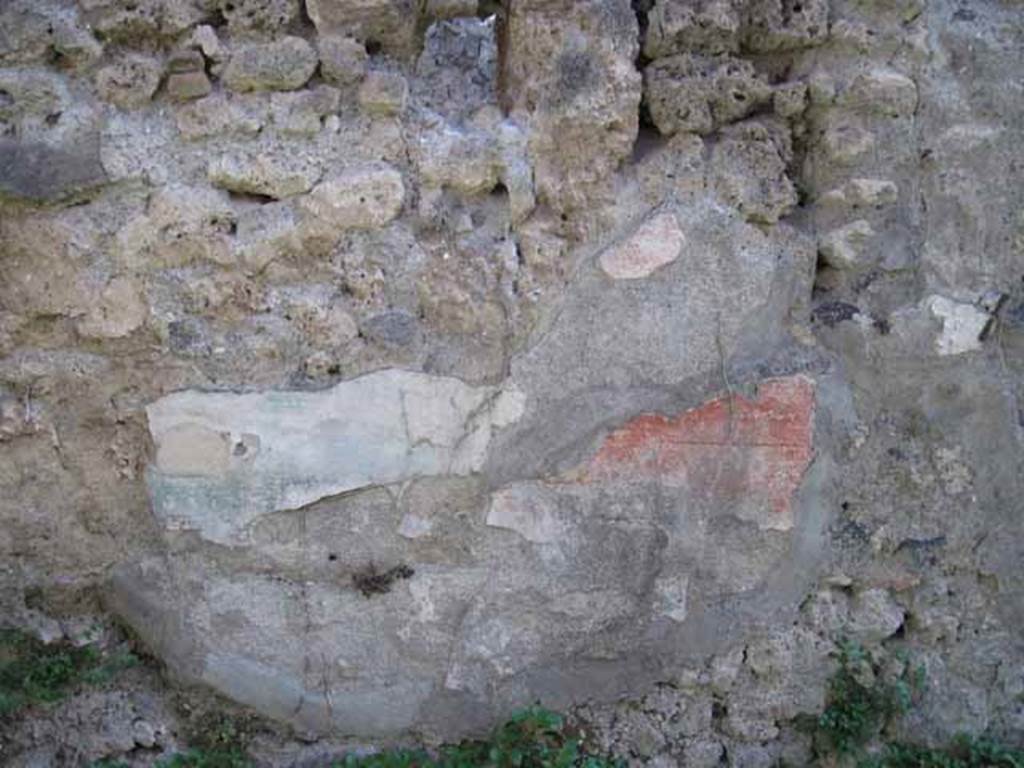 I.2.28 Pompeii. September 2010. Detail of remaining fresco work on south wall of large triclinium. Photo courtesy of Drew Baker.
