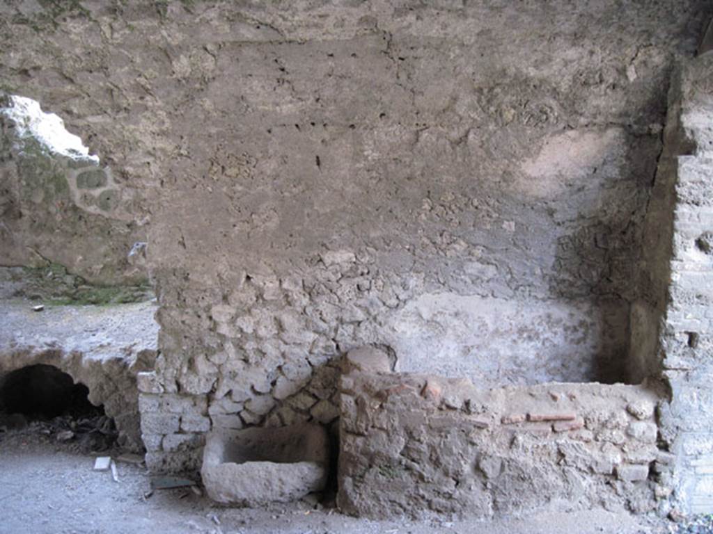 I.3.3 Pompeii. September 2010. Looking west in kitchen towards brick basin or tub in north-west corner. Photo courtesy of Drew Baker
