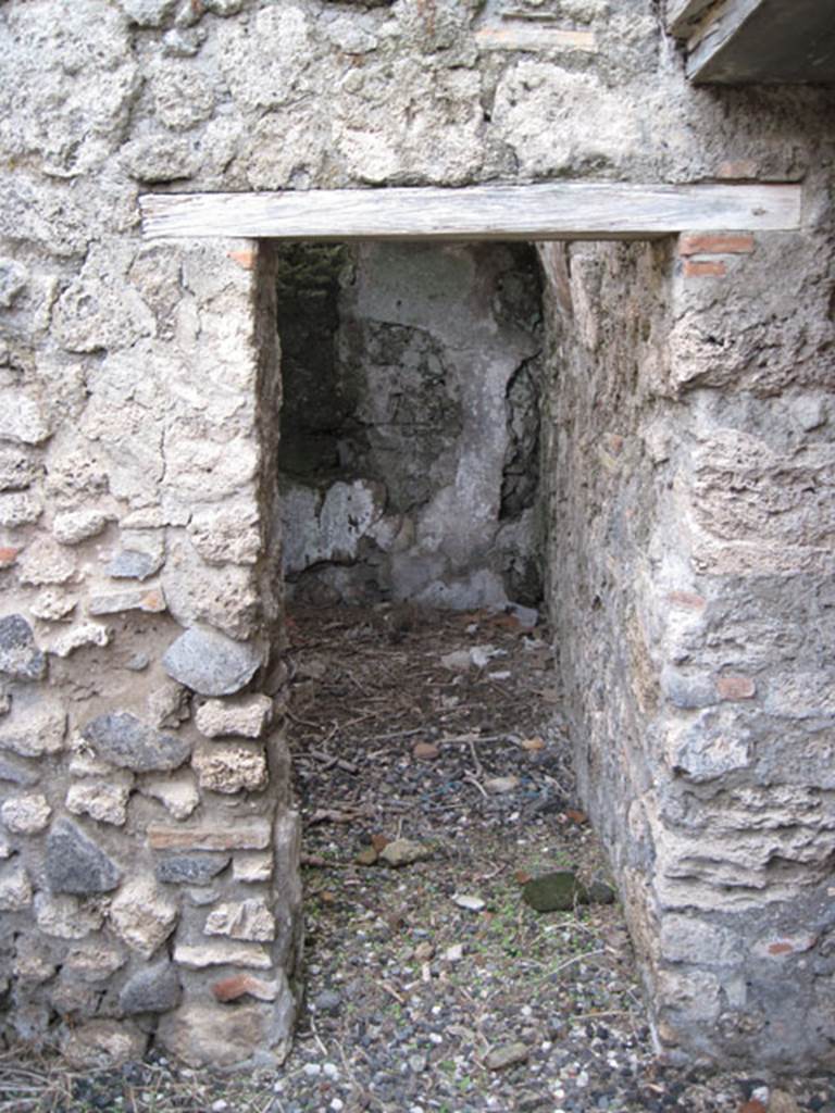 I.3.3 Pompeii. September 2010. Looking east towards doorway into small room, possibly �il repositorio� as described by Fiorelli. Photo courtesy of Drew Baker.
