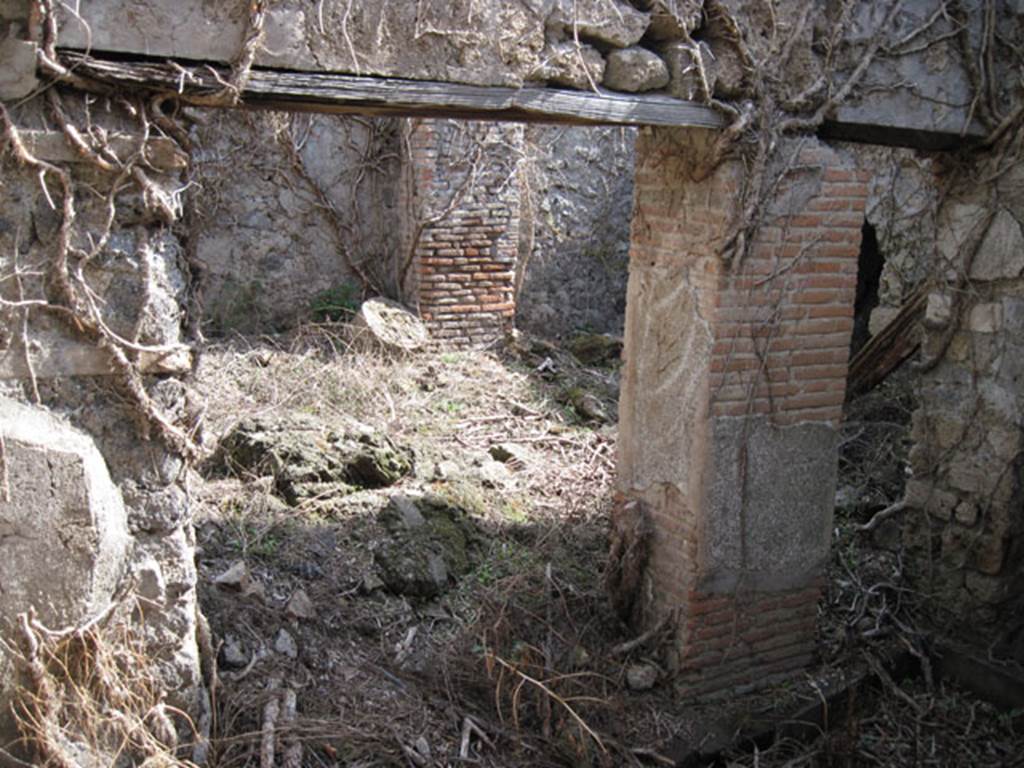 I.3.3 Pompeii. September 2010. Subterranean Level, looking east from yard room towards east wall with two doorways. Photo courtesy of Drew Baker.
