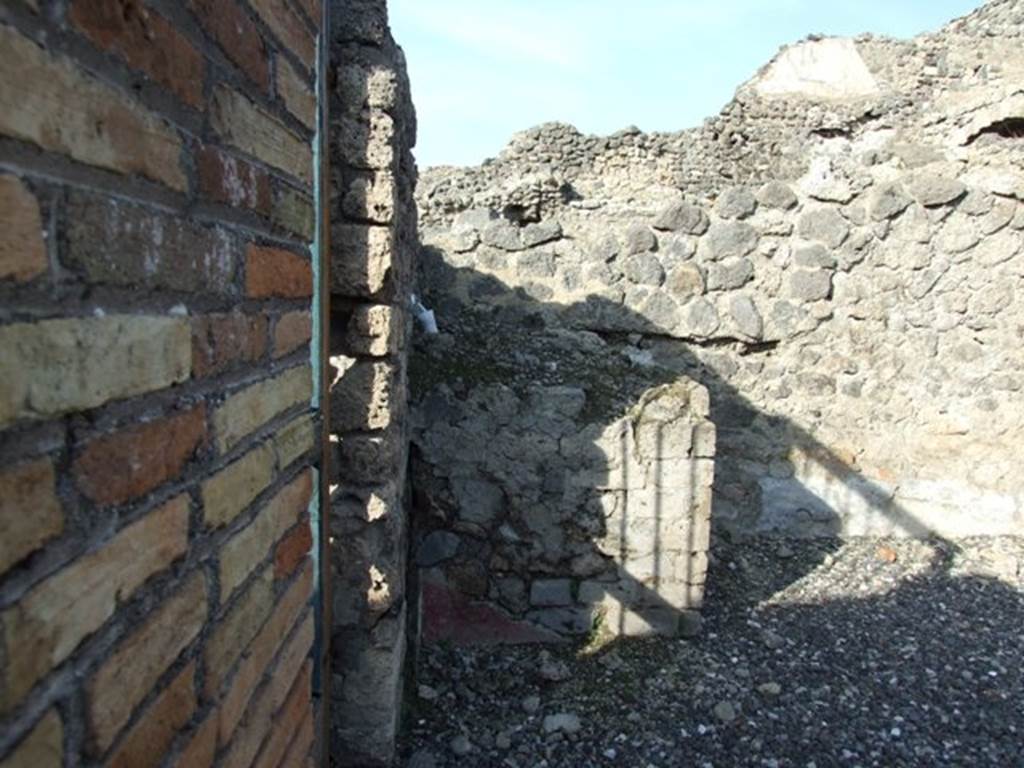 I.3.3 Pompeii. December 2007.  Remains of altar to the household gods in the north-west corner of the atrium. This large masonry podium looked like the base of an aedicula, according to Boyce.
See Boyce G. K., 1937. Corpus of the Lararia of Pompeii. Rome: MAAR 14. (p.24) 

