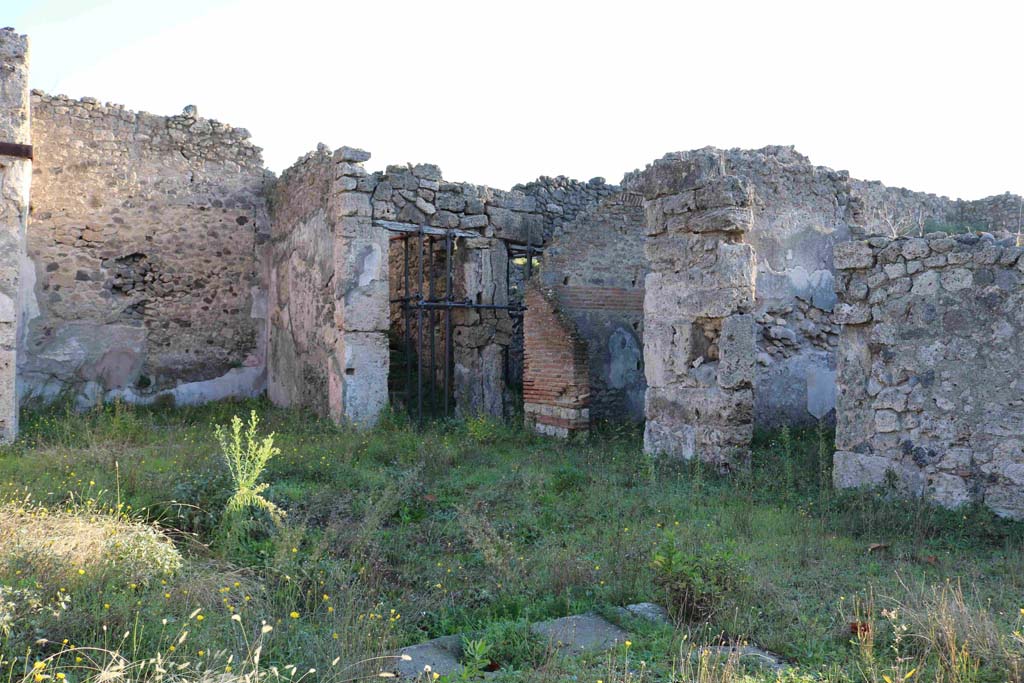 I.3.3 Pompeii. December 2018. 
Looking east across atrium towards tablinum, steps to upper floor, and south wall. Photo courtesy of Aude Durand.

