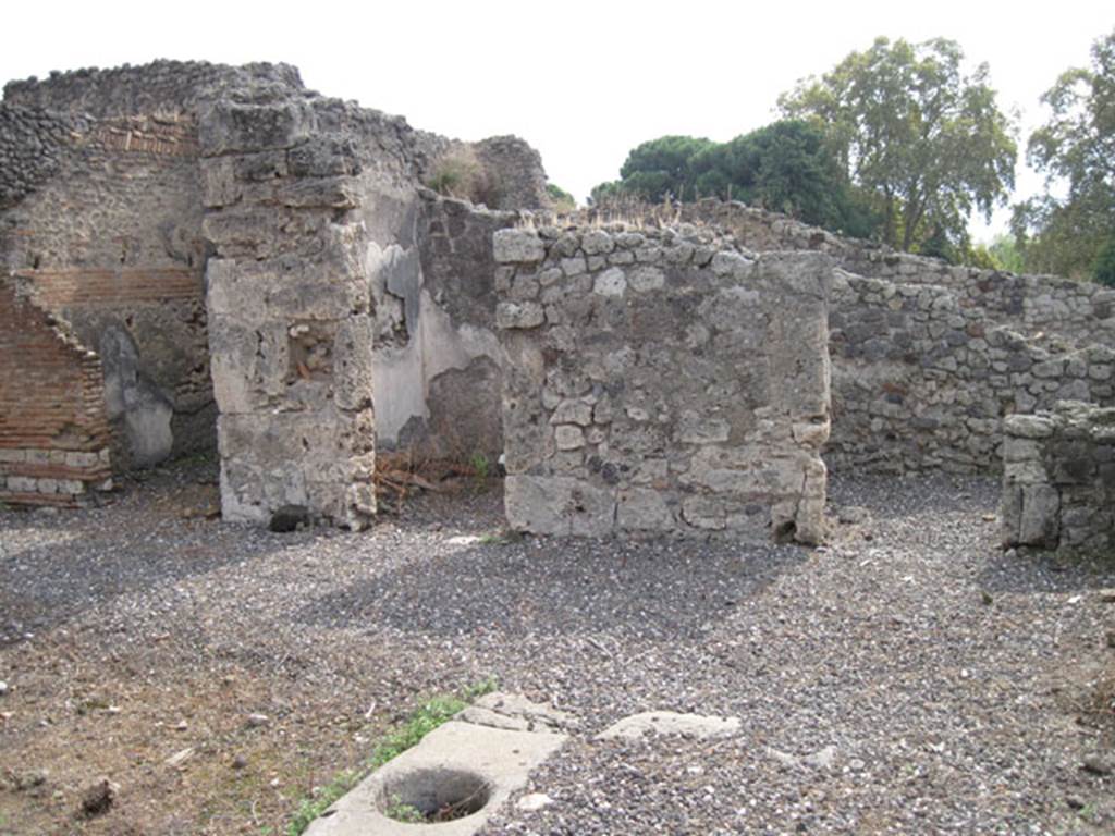 I.3.3 Pompeii. September 2010. Looking towards south wall of atrium. Photo courtesy of Drew Baker. According to Warscher, quoting Mau, from Bull. Inst. 1874, p.177-179, she wrote � �L�impluvio � privo del suo rivestimento di pietra���a destra dell�atrio sono tre camere senza interesse��  (translation: "The impluvium was devoid of its stone cladding ��� to the right of the atrium were three rooms without interest ..."
See Warscher, T, 1935: Codex Topographicus Pompejanus, Regio I, 3:  Rome, DAIR.  
