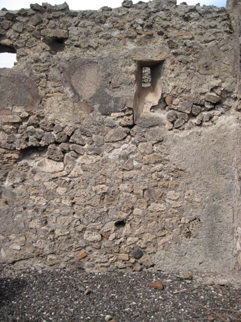 I.3.12 Pompeii. September 2010. North wall in rear room in north-east corner with slit window onto Vicolo del Menandro. Photo courtesy of Drew Baker. According to CTP, when the survey was written  �the north wall of the back room has now vanished�.
See Van der Poel, H. B., 1986. Corpus Topographicum Pompeianum, Part IIIA. Austin: University of Texas. (p.6)
