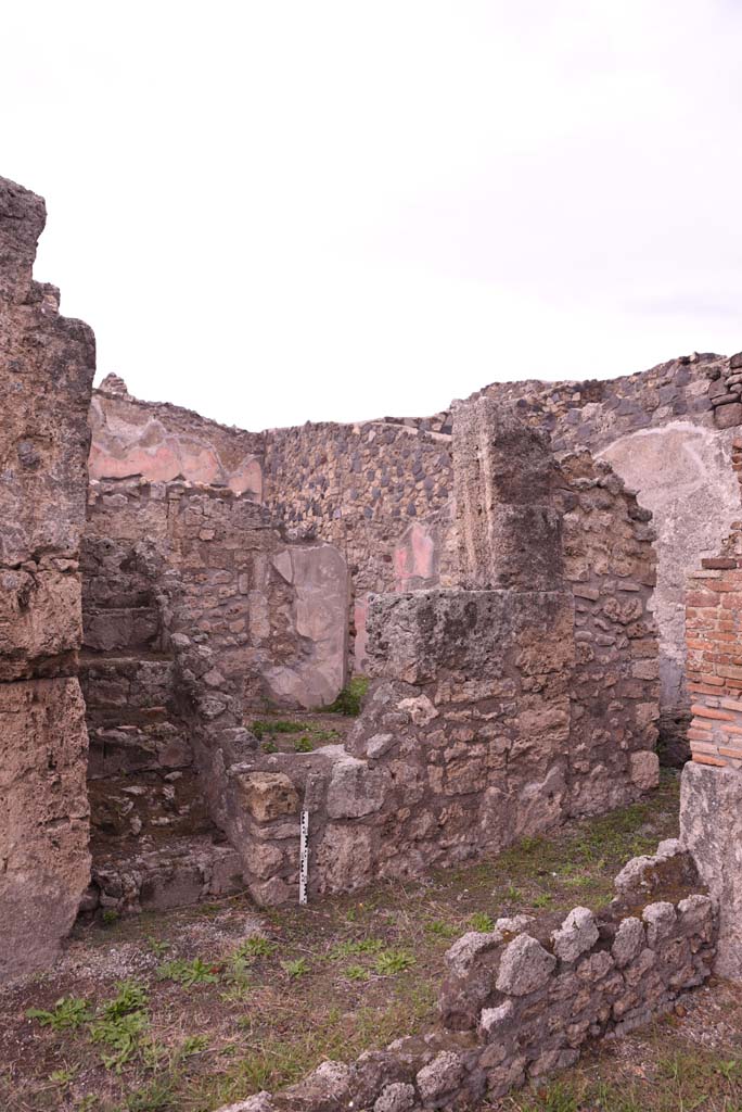 I.4.9 Pompeii. October 2019. 
Corridor i, looking north-east from tablinum, towards steps to upper floor in corridor, and wall of room l (L).
Foto Tobias Busen, ERC Grant 681269 D�COR.
