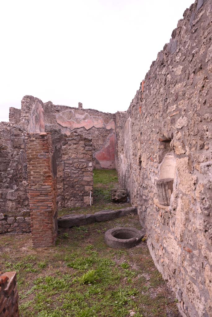 I.4.9 Pompeii. October 2019. 
Courtyard n, looking north towards cistern-mouth in floor, and niche in east wall.
Foto Tobias Busen, ERC Grant 681269 D�COR.
